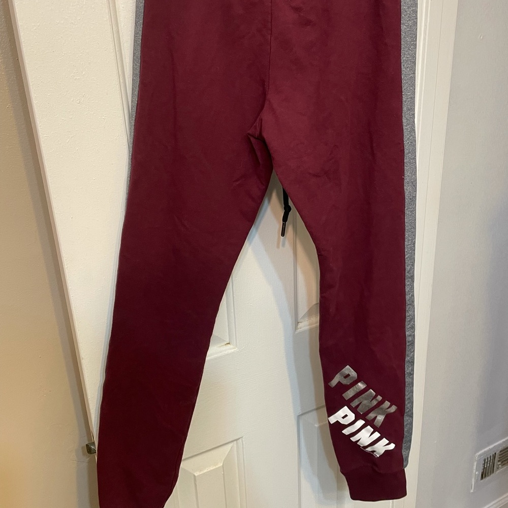 Pink sweat pants.